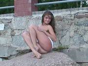 Sexy Brunette Strips In A Public Place