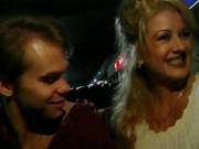 Fake Looking Cougar Fucks Young Guy In Back Of Car