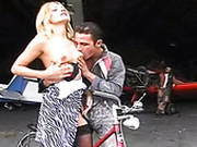 Spoiled Blond Haired Bitch With Big Ass Sucks Two Fat Cocks In Hangar