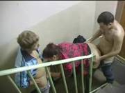 Russian Milf Fucked By Two Guys On The Stairway