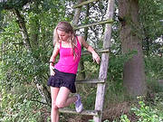Taking Off Her Skirt And Fingering Her Pussy In The Woods