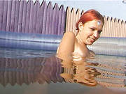 Playful Red Haired Chick Goes Wild In The Pool