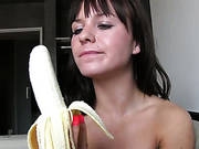 Topless Brunette Babe Bella Eating Banana Passionately