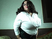Mature With Giant Tits In A Tight Blouse