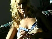 Impressive Blonde Smoking While Masturbating