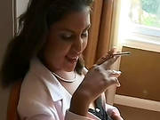 Arousing Gal Poses Nude While Smoking