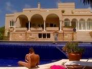 Desirable Blonde With Hot Tanned Body Playing With Two Cocks In The Pool