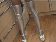 Sexy Brunette Does Striptease In Silver