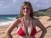 Hot Bikini Girl Danielle Is Showing Her Big Hooters On A Beach