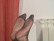 Long Legs And Lovely Feet In A Pair Of Black Pantyhose