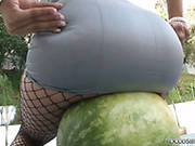 Charming Brunette Babe Smashes Watermelon With Juicy Ass