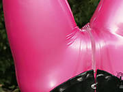 Latex Wearing Chick Is Sucking Hard Stick Being Hanged Up Side Down