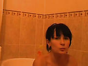 Amateur Brunette Girlfriend Masturbating And Sucking Cock In The Bathroom