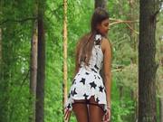 Slender Babe Masturbates In The Forest.