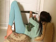 Young Brunette  Doing A Striptease