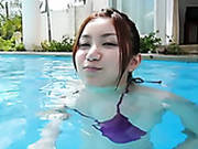 Salty Japanese Hussy Swims In Pool In Tiny Bikini