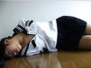 Foxy Japanese Teen Noah Lays On The Floor With Her Hands Cuffed