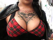 Tattooed And Pierced Slut Gives A Blowjob To Oversized Cock