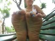 Latin Girl Shows Off Her Feet Outdoors