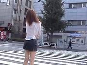 Kinky Japanese Girl Shows Off Her Butt In The Street