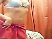 Young Blonde In Flirty Lingerie Strips In Front Of The Camera