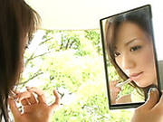 Classy Japanese Strumpet Mario Fujii Sits On The Chair Flashing Her Hips