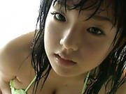 Neat Brunette Japanese Teen Flaunts Her Curves In Swimming Suit