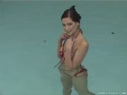 Hot Brunette Evelyn Lory Stripping And Teasing In The Pool