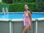 Wonderful Ebony Posing At The Poolside