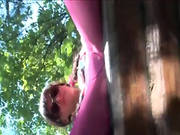 Girl Rubbing The Button On The Bench