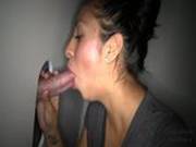 Two Hot Sluts Suck Cock Through A Glory Hole