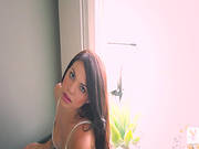 Lissette Marie Lying On The Sofa And Posing
