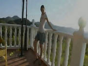 Super Cute Girl Toying On The Terrace