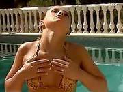Oiled-up Hottie Plays With Herself In The Sun