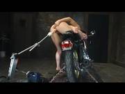 White Chick Fucks A Fuck Machine While On A Bike