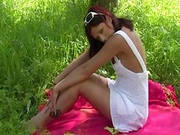 Topless Beauty On A Blanket