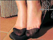 Soft Nylon Sensually Clings To The Perfect Feet Of A Pretty Redhead