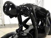 Rubber Cutie Gives Hawt Orall-service