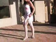 Kelli Tyler In Dress And Stockings But With No Panties Fingers Her Muff Outdoors