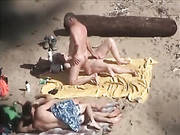 Horny Couples Fuck On The Nude Beach