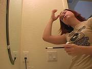 Anna Is Filmed In The Bathroom Putting On Makeup