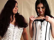 Two Sex Appeal Chicks In Corset Fuck Each Other With Fingers