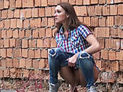 Whorish Brunette Sweetie Made A Lot Piss Near Brick Fence