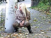 Lusty Blond Milf In Autumn Coat Pisses In The Mid Of The Street