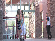 Lesbian Babes Fondles Her Hand Under The Skirt For Turning Her On In Public Place