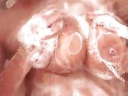 Slut Dominno Soaps Up Her Titties & Pleasures Her Clit