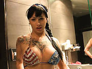 Busty Tattooed Brunette Shows Off Her Charms And Gives Tug Job