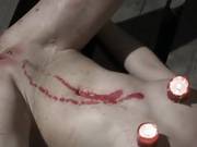 Bondage Babe Endures Candle Wax Treatment