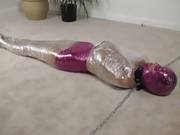 Fetish Babe Wrapped Up Like A Mummy