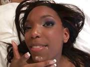 Black Babe Sprayed With Spunk From A White Dick